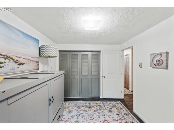 a view of a kitchen with a sink
