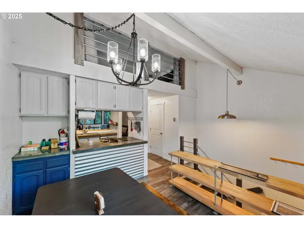 a view of living room and kitchen