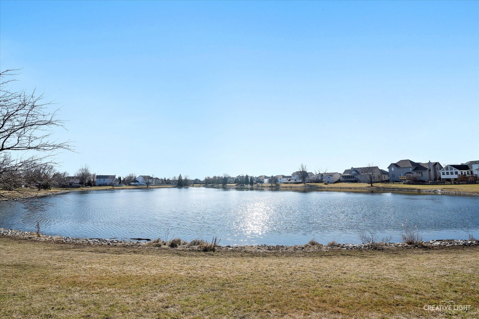 13332 Round Barn Road Plainfield, IL 60585 - Photo 26 of 30 a view of a lake with a lake in the background
