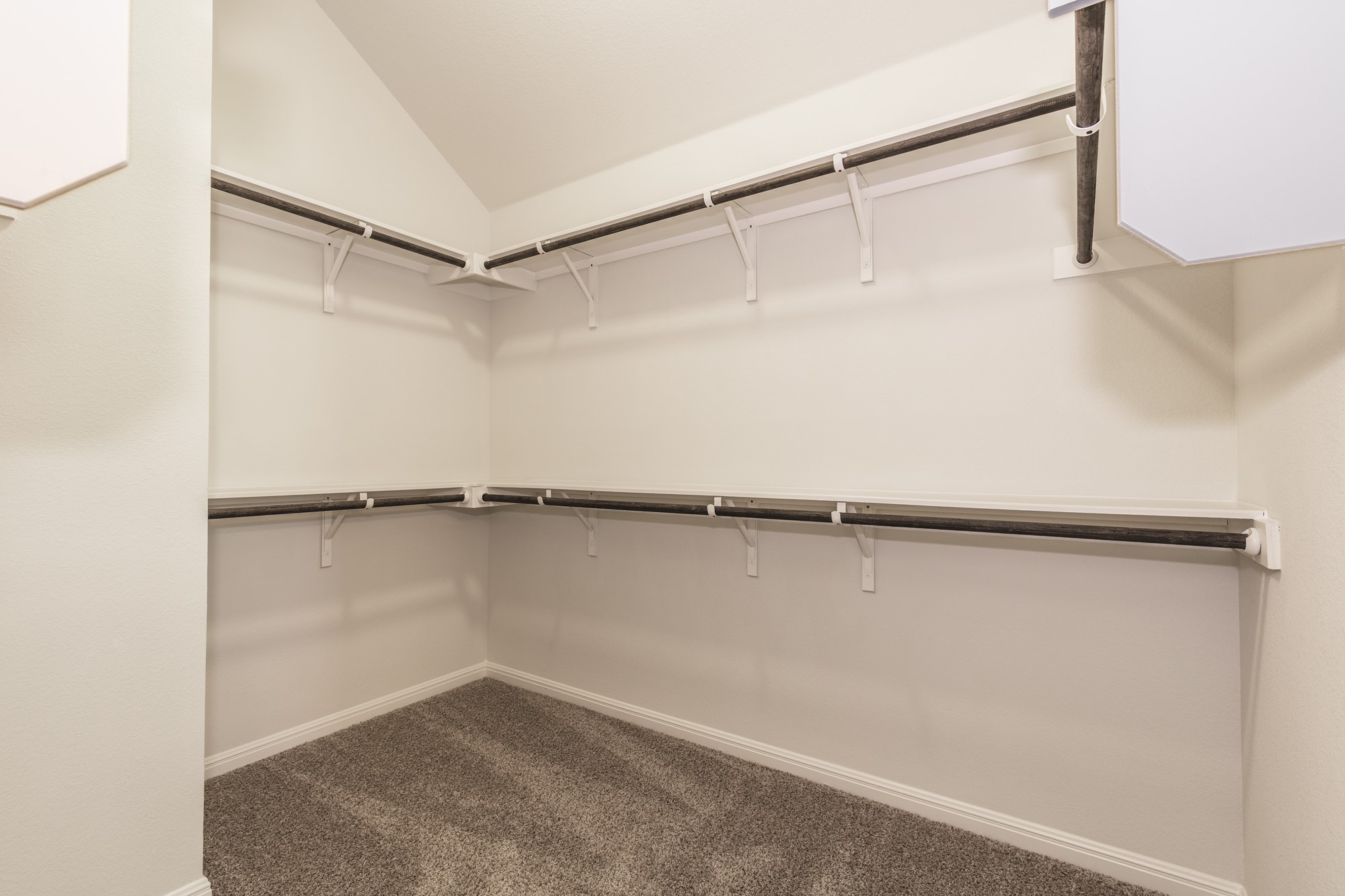 2725 Hopi Path Leander, TX 78641 - Photo 30 of 30 A well-organized walk-in closet offers ample storage space with built-in shelving and hanging rods.