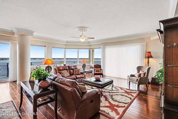 a large kitchen with stainless steel appliances granite countertop a refrigerator and a sink