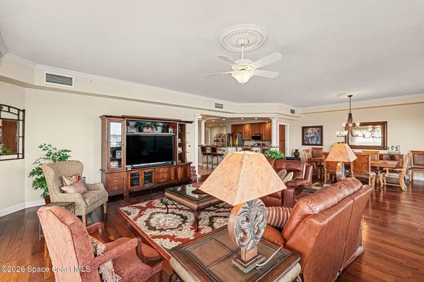 a store room with lots of clutter and furniture