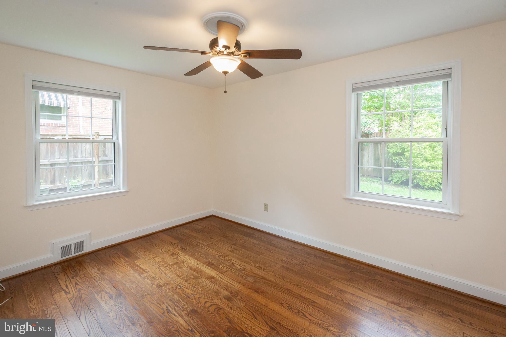 2016 Lansdowne Way Silver Spring, MD 20910 - Photo 12 of 23 a view of a room with wooden floor and windows
