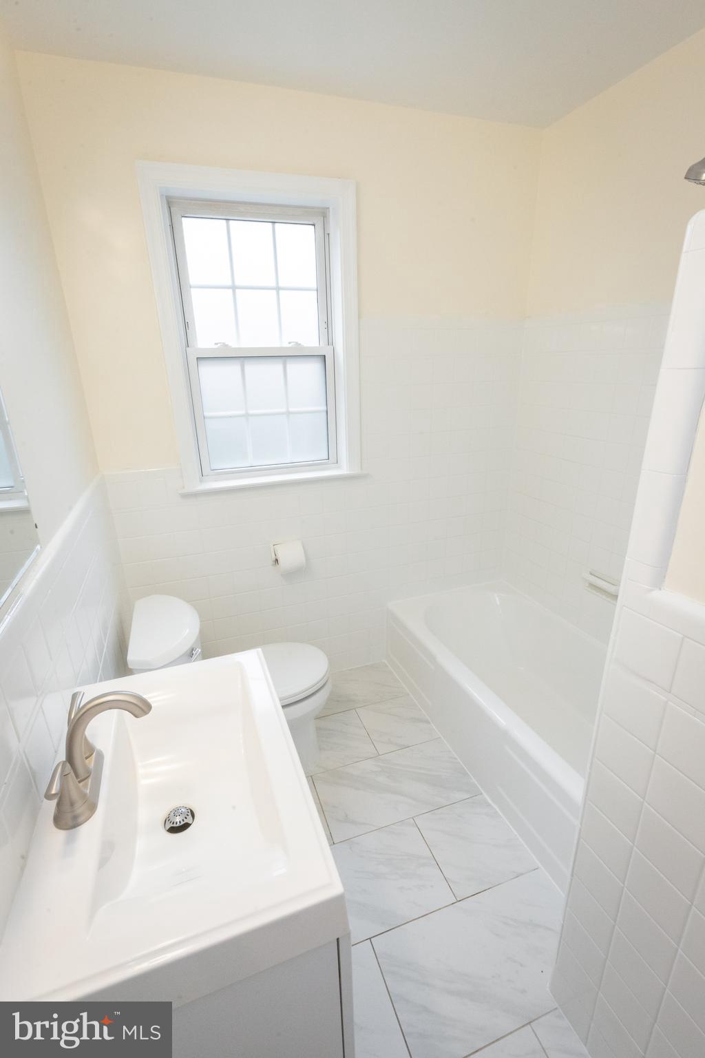 2016 Lansdowne Way Silver Spring, MD 20910 - Photo 13 of 23 a bathroom with a bathtub and sink