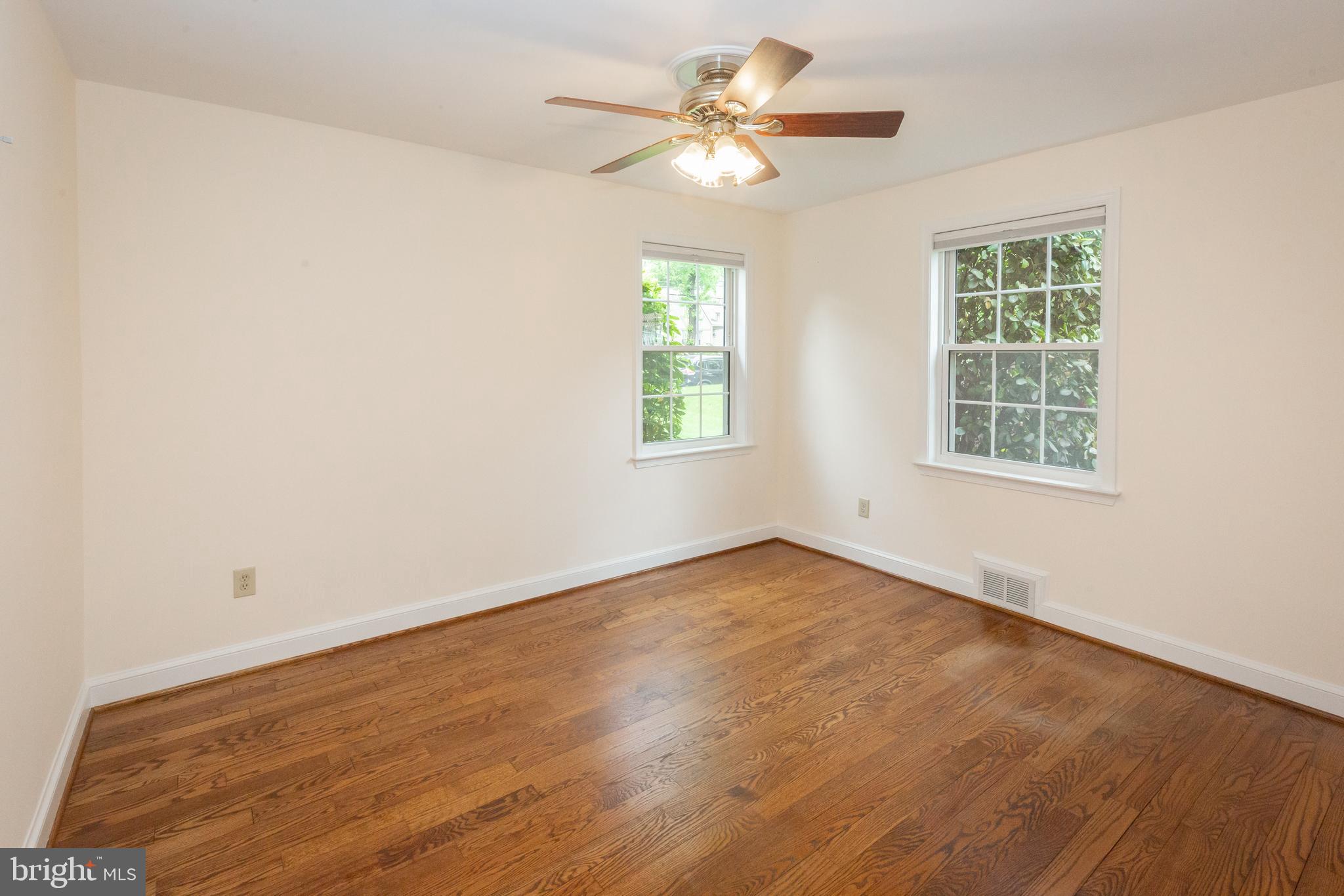 2016 Lansdowne Way Silver Spring, MD 20910 - Photo 10 of 23 an empty room with a window and a fan