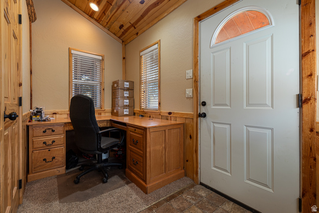 1505 West Elk Ridge Drive Alton, UT 84710 - Photo 15 of 53 Office area featuring vaulted ceiling, wooden ceiling, wainscoting, wooden walls, and a textured wall