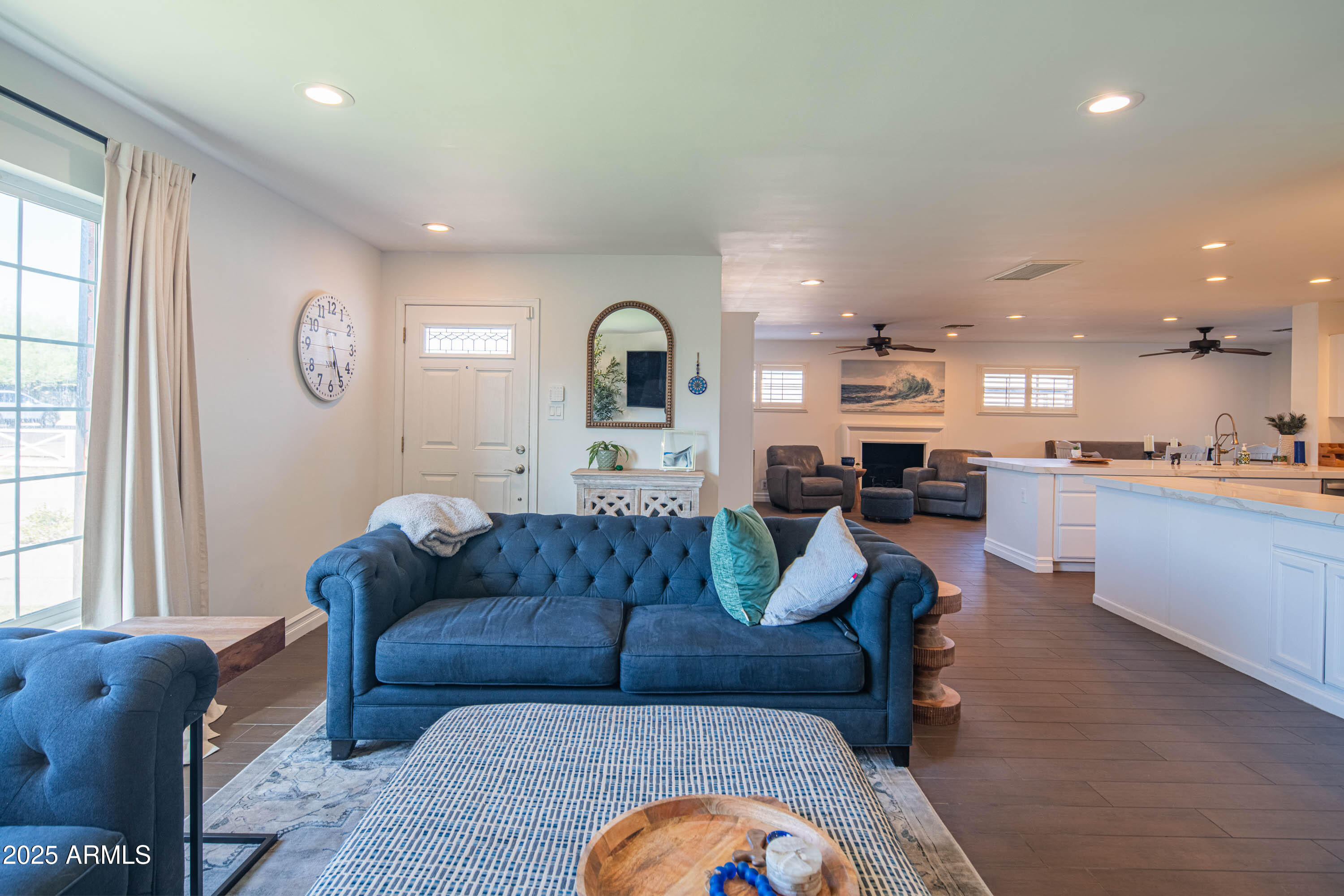 1909 East Bethany Home Road Phoenix, AZ 85016 - Photo 14 of 71 a living room with furniture and a large window
