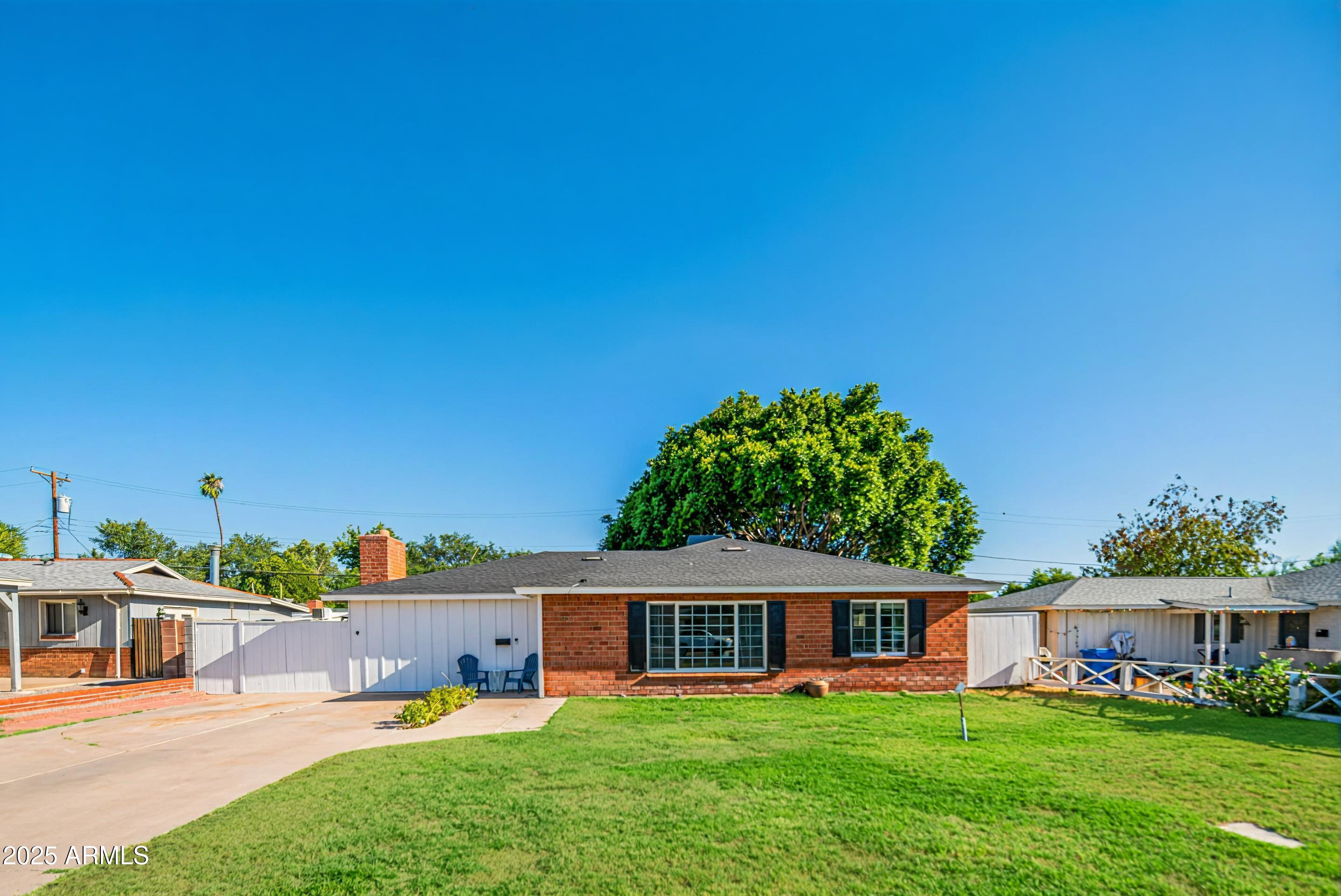 1909 East Bethany Home Road Phoenix, AZ 85016 - Photo 2 of 71 a view of a house with a big yard