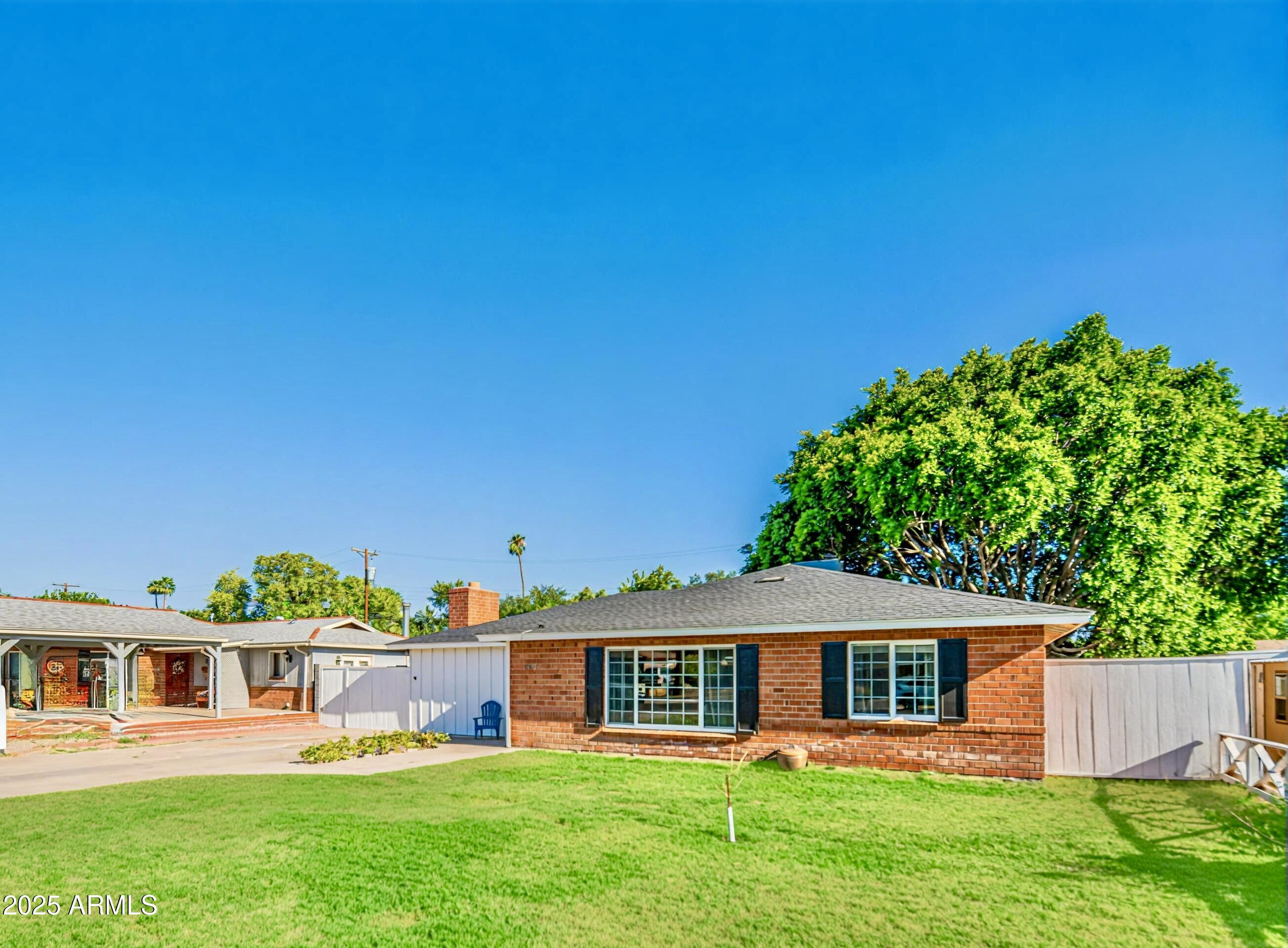 1909 East Bethany Home Road Phoenix, AZ 85016 - Photo 4 of 71 front view of a house with a yard