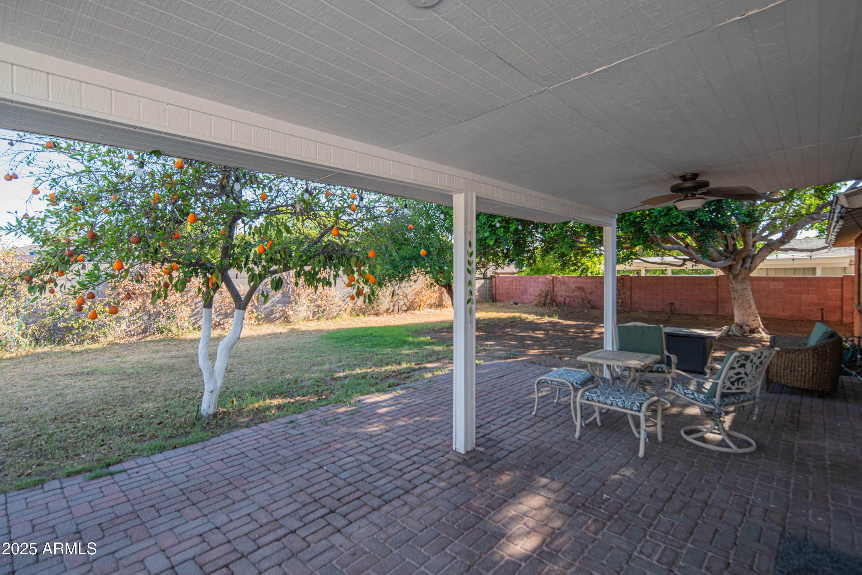 1909 East Bethany Home Road Phoenix, AZ 85016 - Photo 44 of 71 a view of a patio with table and chairs potted plants with wooden floor