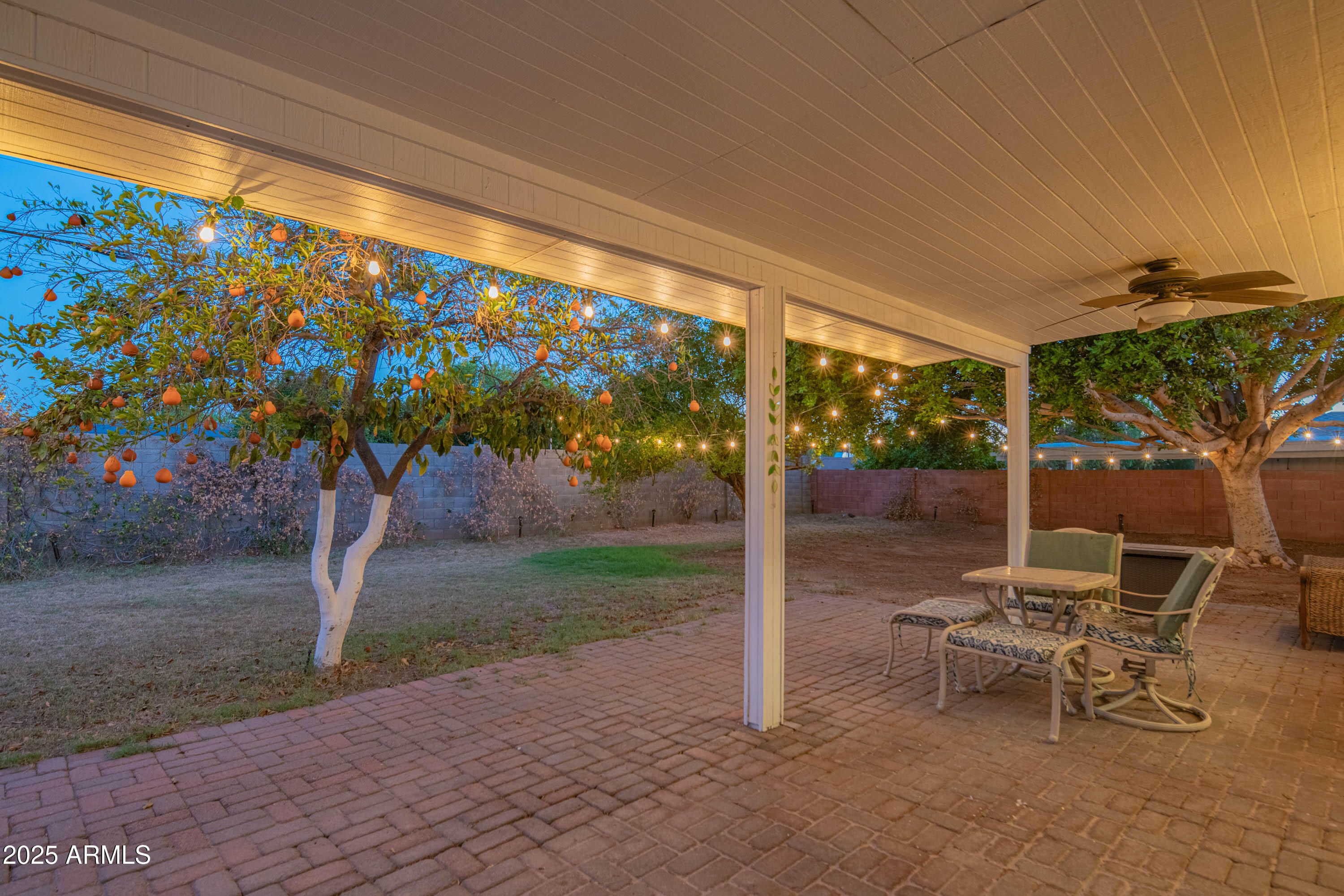 1909 East Bethany Home Road Phoenix, AZ 85016 - Photo 51 of 71 a view of a chairs and table in backyard