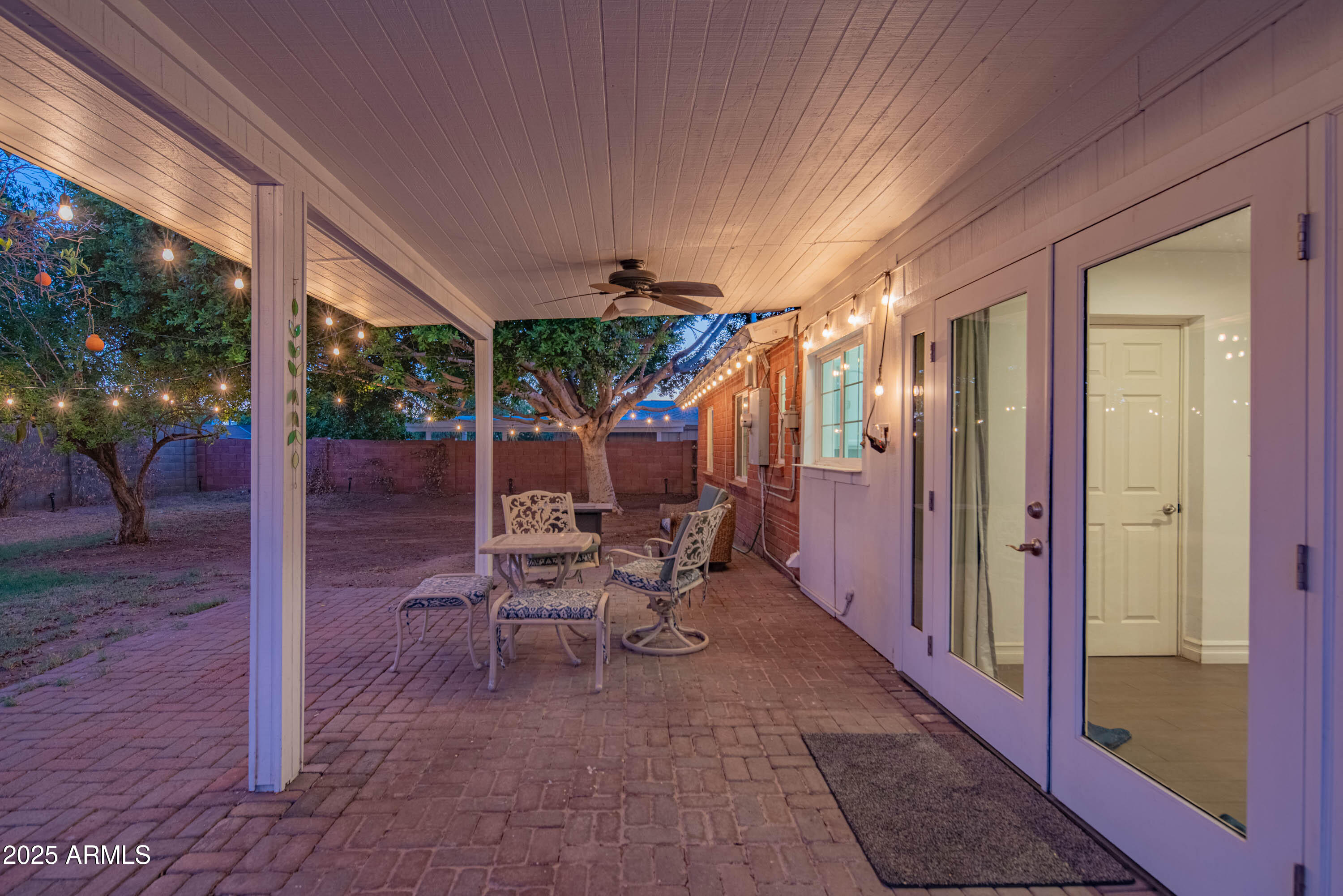 1909 East Bethany Home Road Phoenix, AZ 85016 - Photo 59 of 71 a view of a porch with chairs and backyard