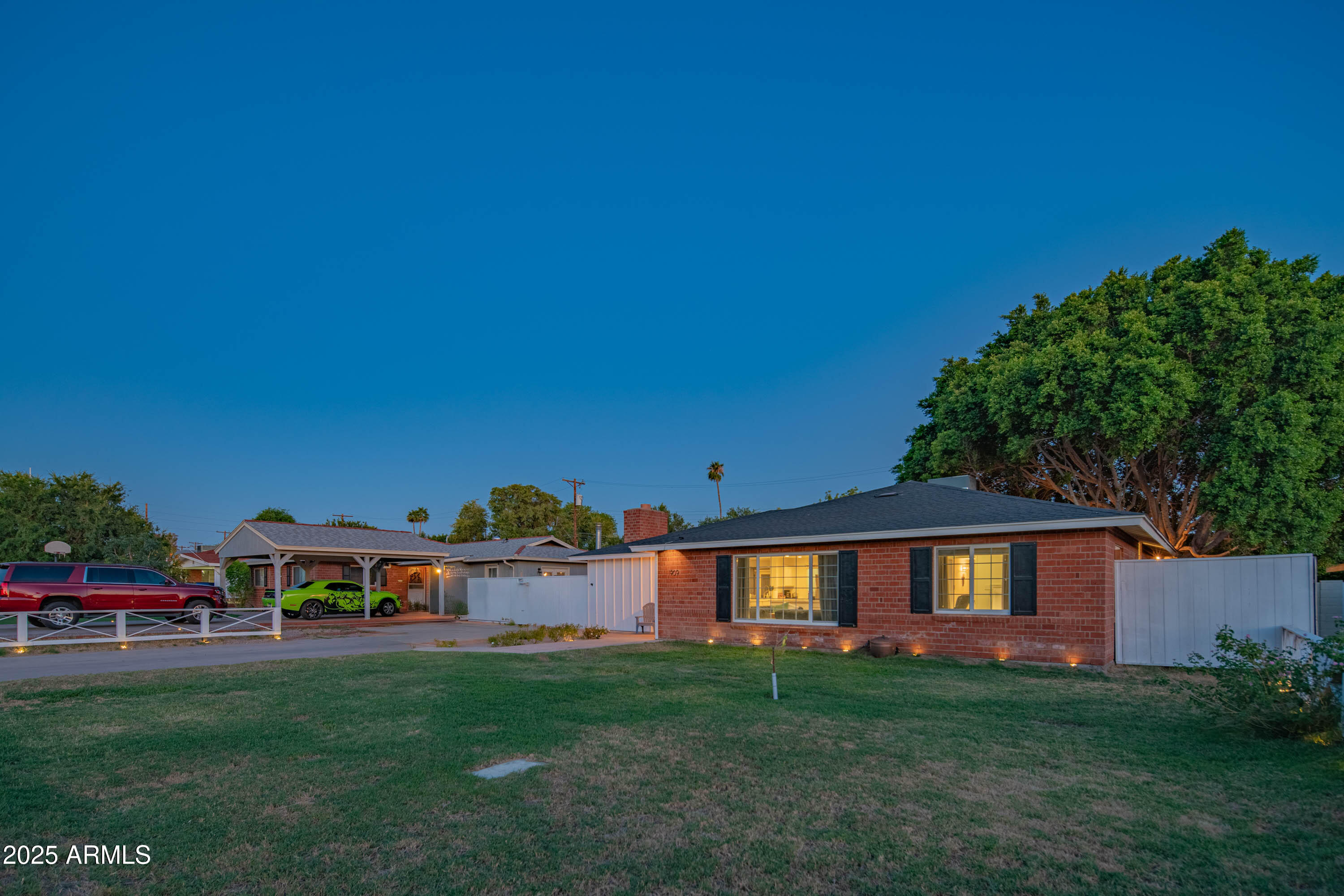 1909 East Bethany Home Road Phoenix, AZ 85016 - Photo 9 of 71 a front view of a house with a garden and porch