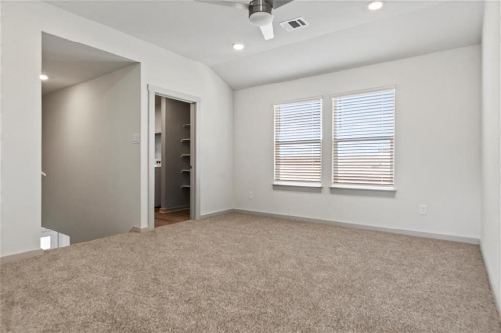 530 Wilshire Road San Marcos, TX 78666 - Photo 14 of 30 an empty room with windows and closet