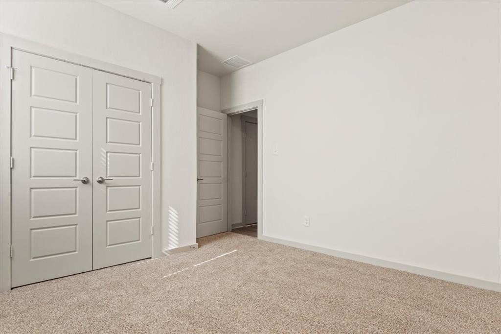 530 Wilshire Road San Marcos, TX 78666 - Photo 23 of 30 an empty room with closet area