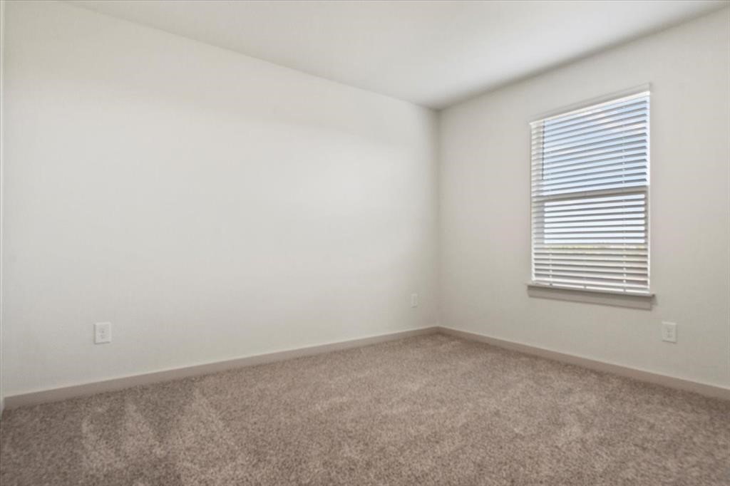 530 Wilshire Road San Marcos, TX 78666 - Photo 24 of 30 an empty room with a window