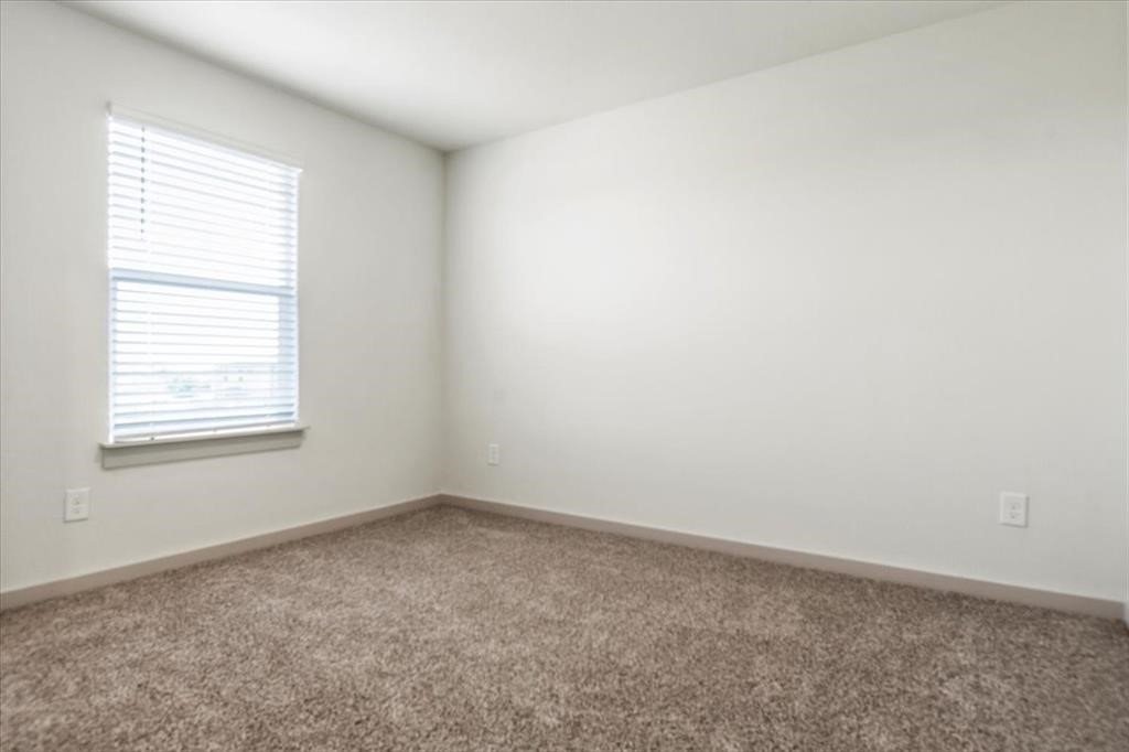 530 Wilshire Road San Marcos, TX 78666 - Photo 27 of 30 an empty room with a window