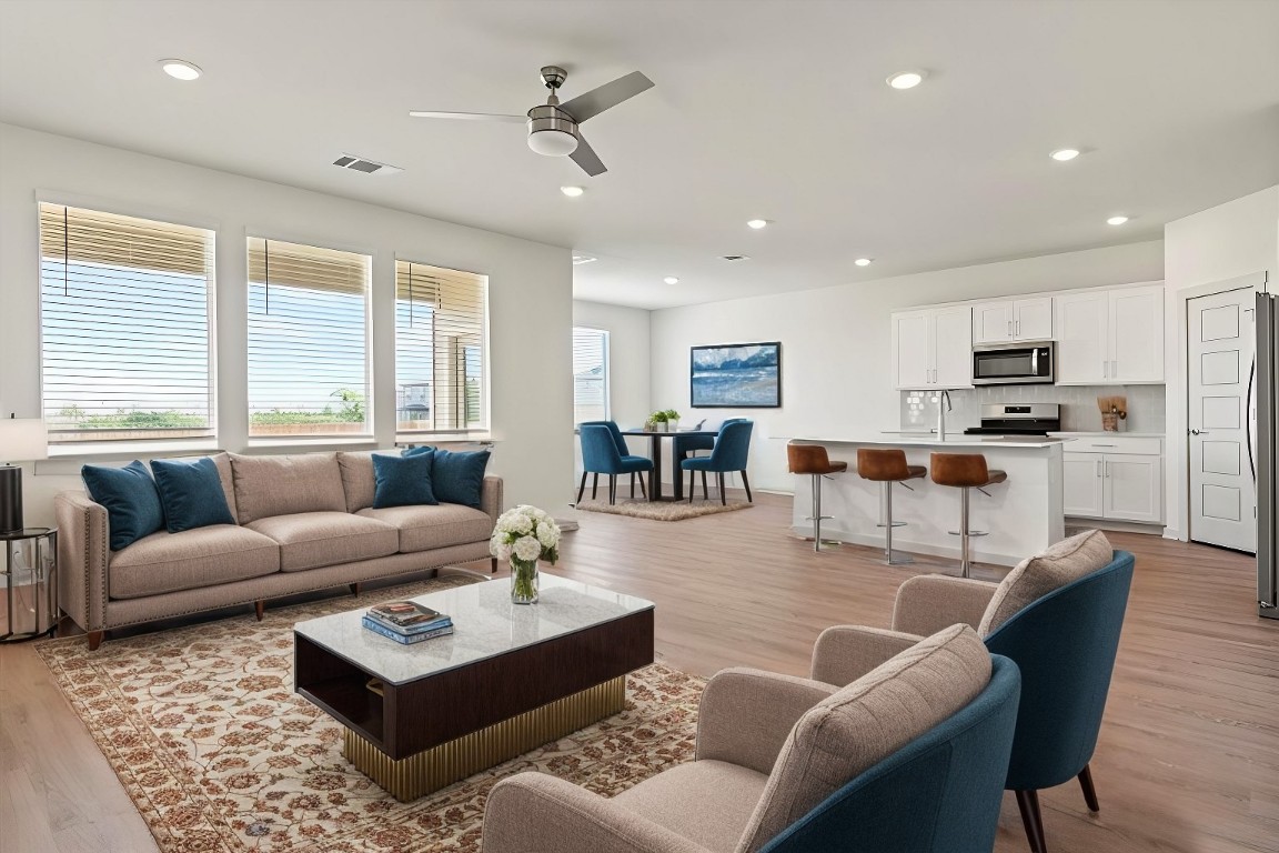 530 Wilshire Road San Marcos, TX 78666 - Photo 3 of 30 a living room with furniture kitchen view and a large window