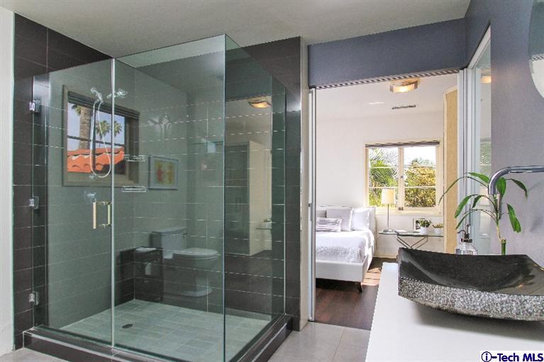 386 South Meridith Avenue Pasadena, CA 91106 - Photo 16 of 28 a living room with furniture and a glass door