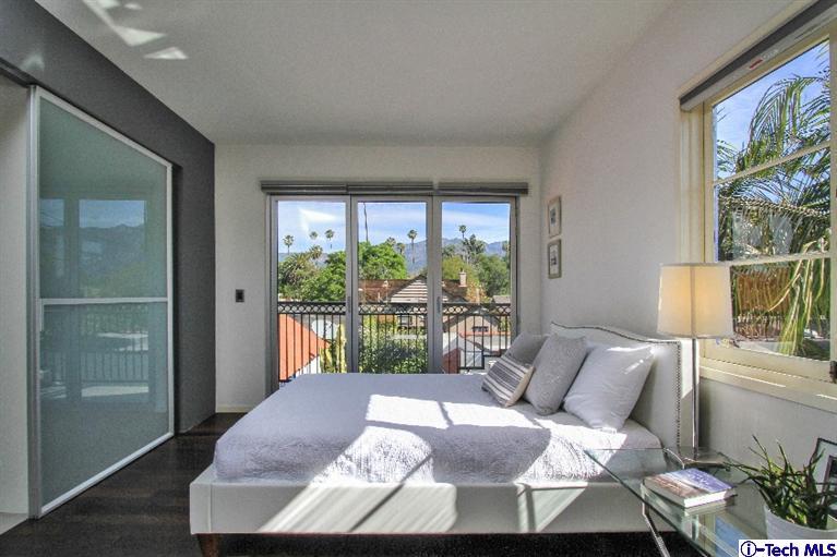 386 South Meridith Avenue Pasadena, CA 91106 - Photo 19 of 28 a living room with a large window