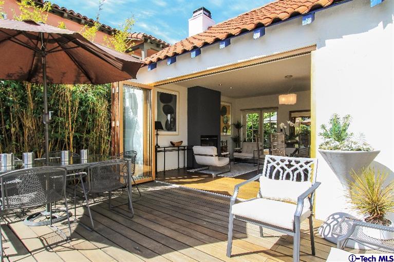 386 South Meridith Avenue Pasadena, CA 91106 - Photo 23 of 28 a view of a patio with couches table and chairs