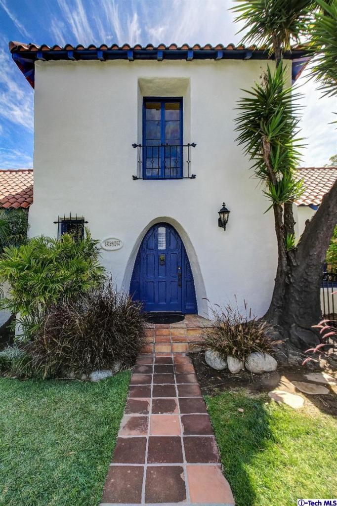 386 South Meridith Avenue Pasadena, CA 91106 - Photo 28 of 28 a front view of a house with a yard