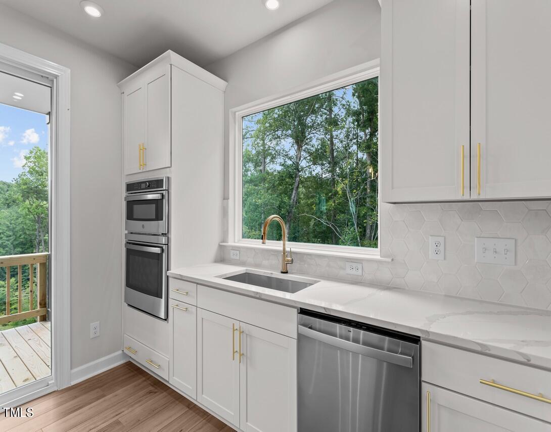 4822 Cypress Tree Lane, Unit 1 Raleigh, NC 27612 - Photo 4 of 33 Kitchen with view