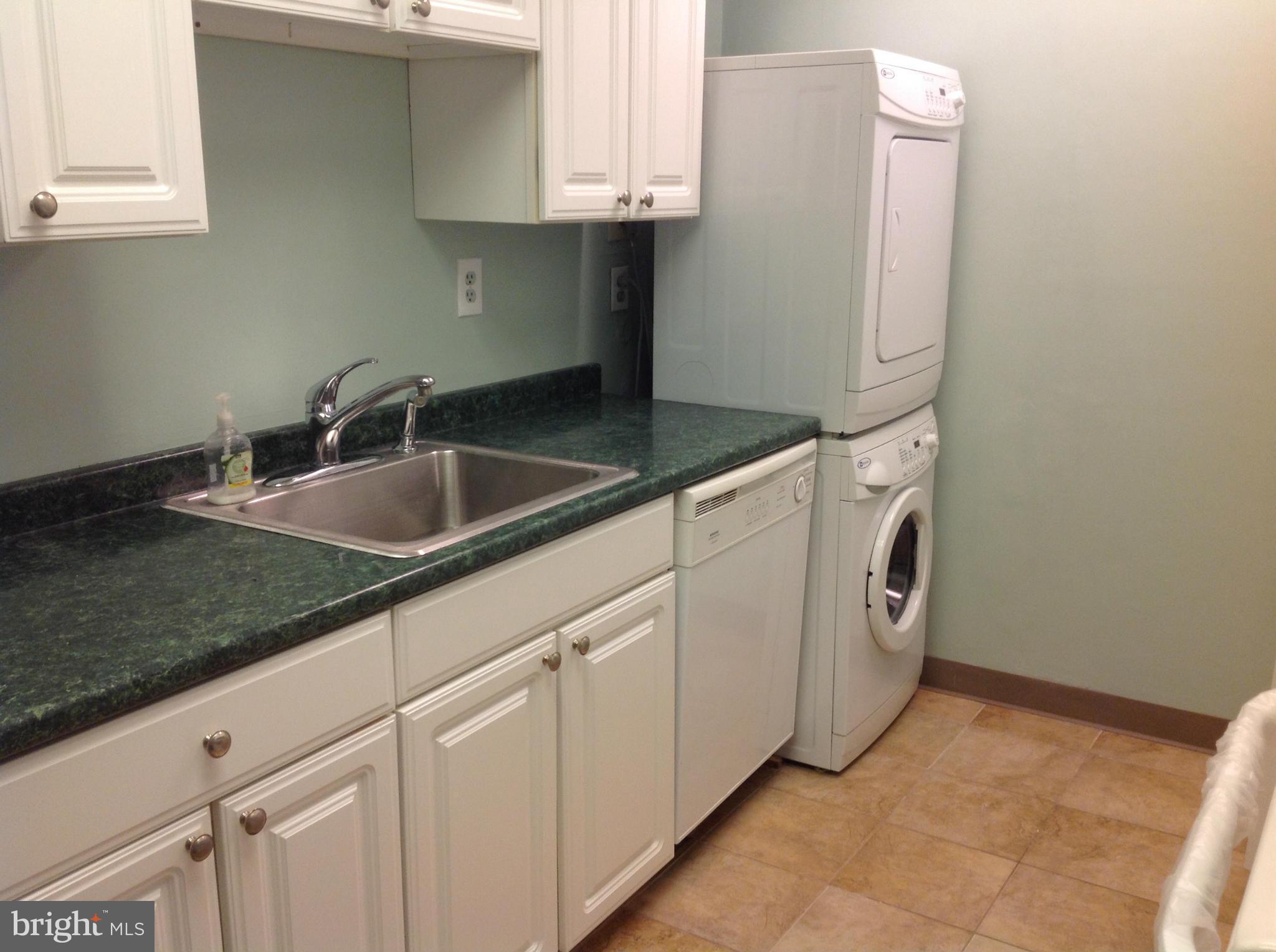 5911 Edsall Road, Unit 107 Alexandria, VA 22304 - Photo 3 of 11 a kitchen with sink and cabinets