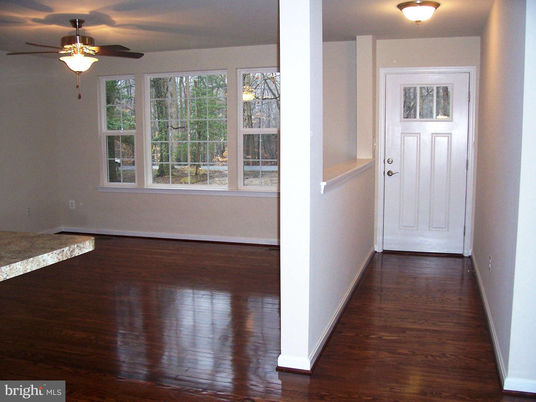 361 Emerson Road Owings, MD 20736 - Photo 2 of 25 a view of a livingroom with wooden floor