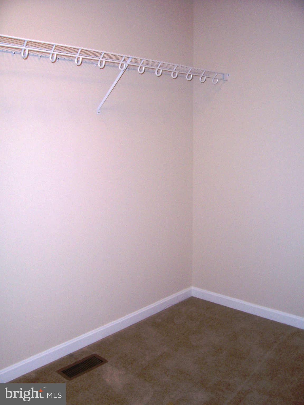 361 Emerson Road Owings, MD 20736 - Photo 14 of 25 a view of a room with racks on the wall
