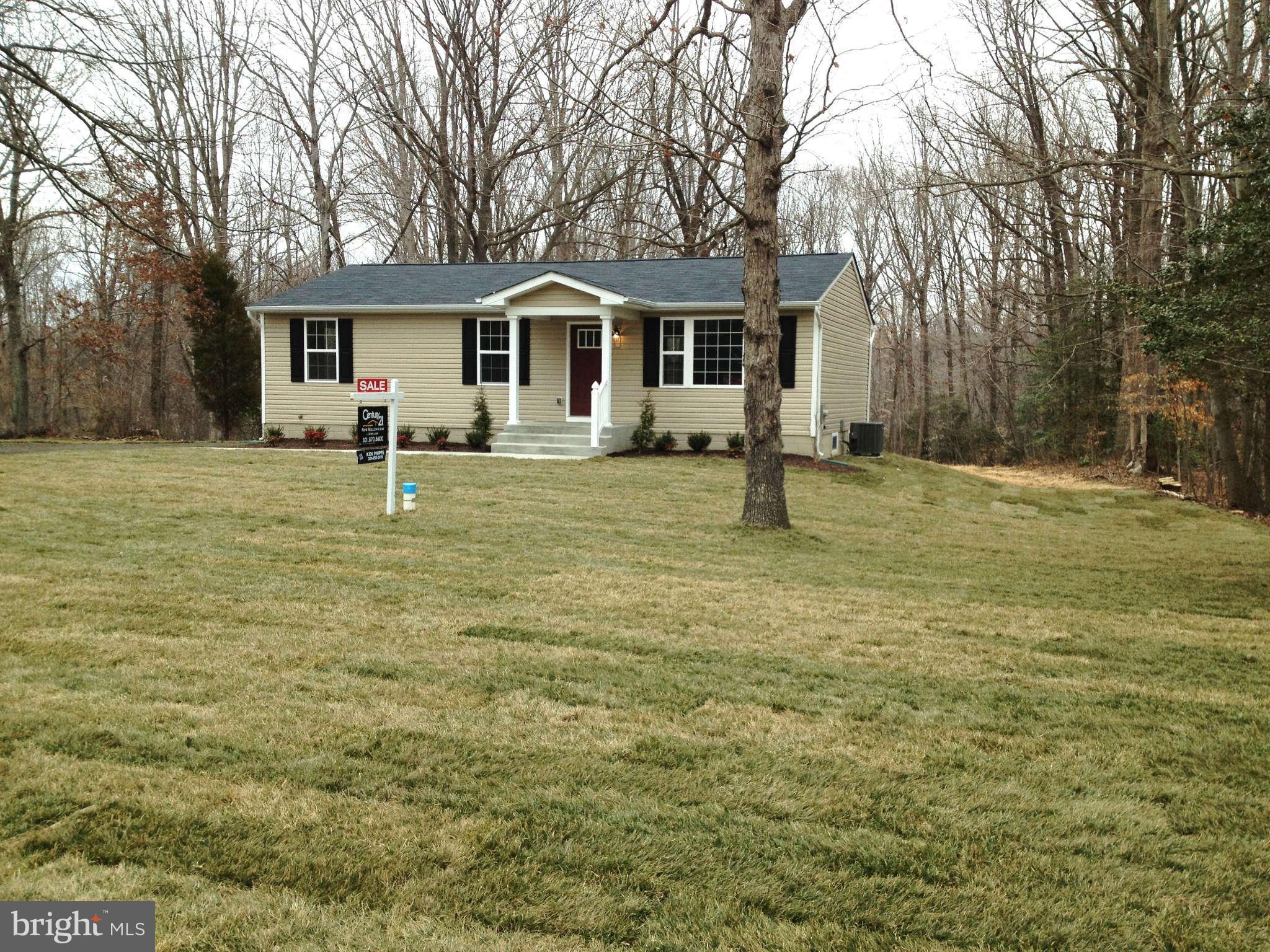 361 Emerson Road Owings, MD 20736 - Photo 21 of 25 a house that has a tree in front of it