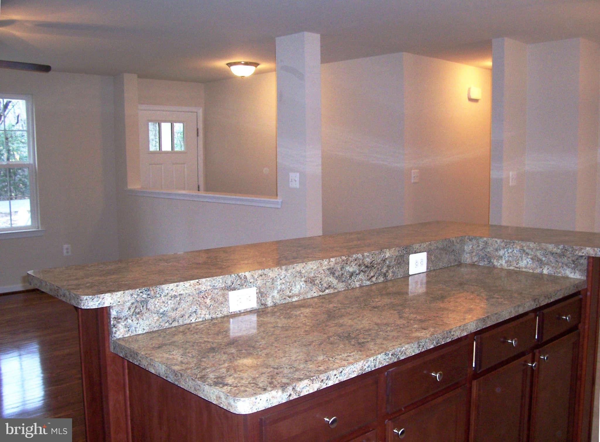 361 Emerson Road Owings, MD 20736 - Photo 5 of 25 a bathroom with a granite countertop sink and a mirror