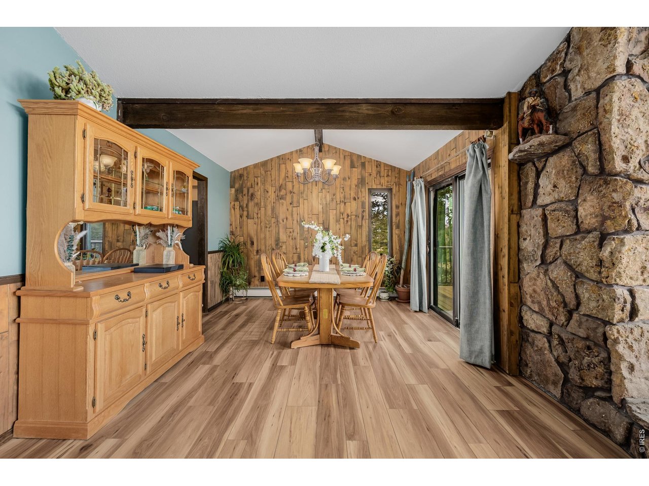 37 High View Lane Boulder, CO 80302 - Photo 12 of 50 a dining room with a sink and wooden floor