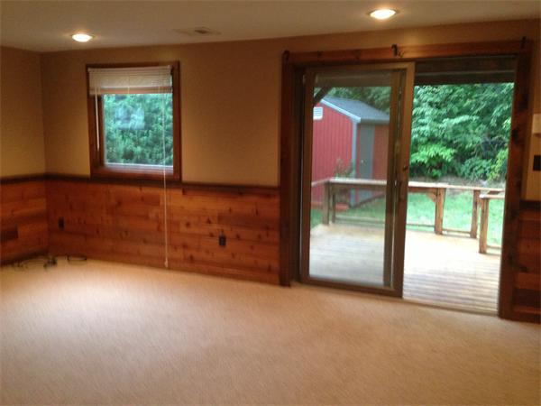 35 Dale Road Holbrook, MA 02343 - Photo 12 of 27 an empty room with large window and a fireplace