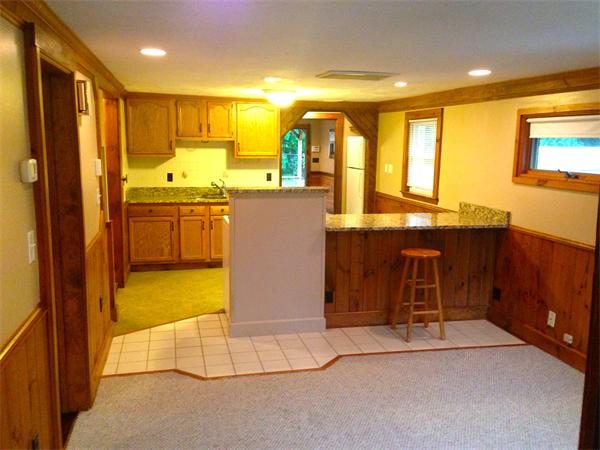 35 Dale Road Holbrook, MA 02343 - Photo 3 of 27 a view of a kitchen with a refrigerator and a sink