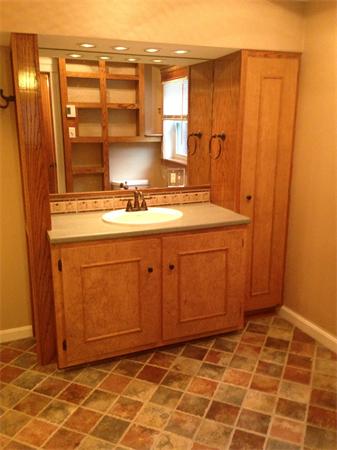 35 Dale Road Holbrook, MA 02343 - Photo 5 of 27 a bathroom with a sink a vanity and a shower