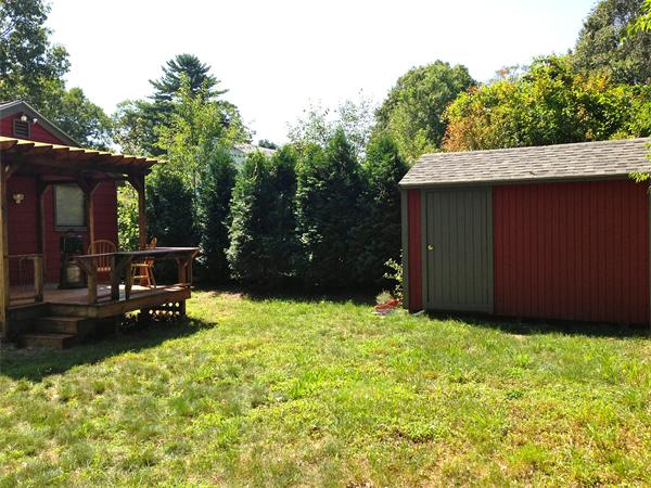 35 Dale Road Holbrook, MA 02343 - Photo 8 of 27 a backyard of a house with table and chairs