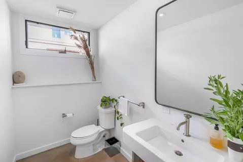 a bathroom with a sink and a toilet