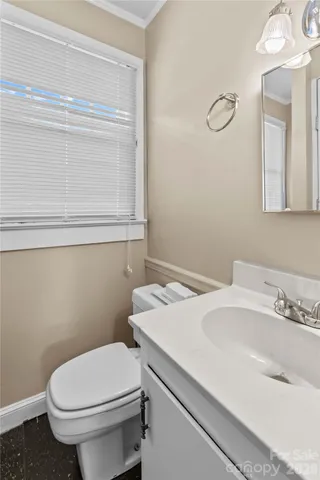 a bathroom with a sink and a toilet