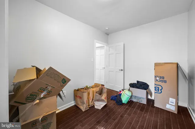 a bathroom with a toilet a sink and a shower