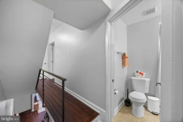 a room with a window and storage space