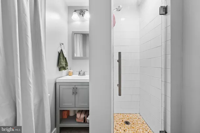 a bedroom with a bed and dresser