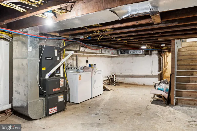 a view of house with wooden stairs