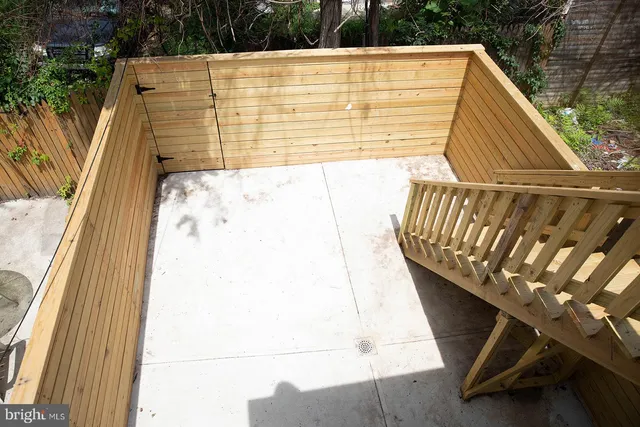 a front view of a house with many windows