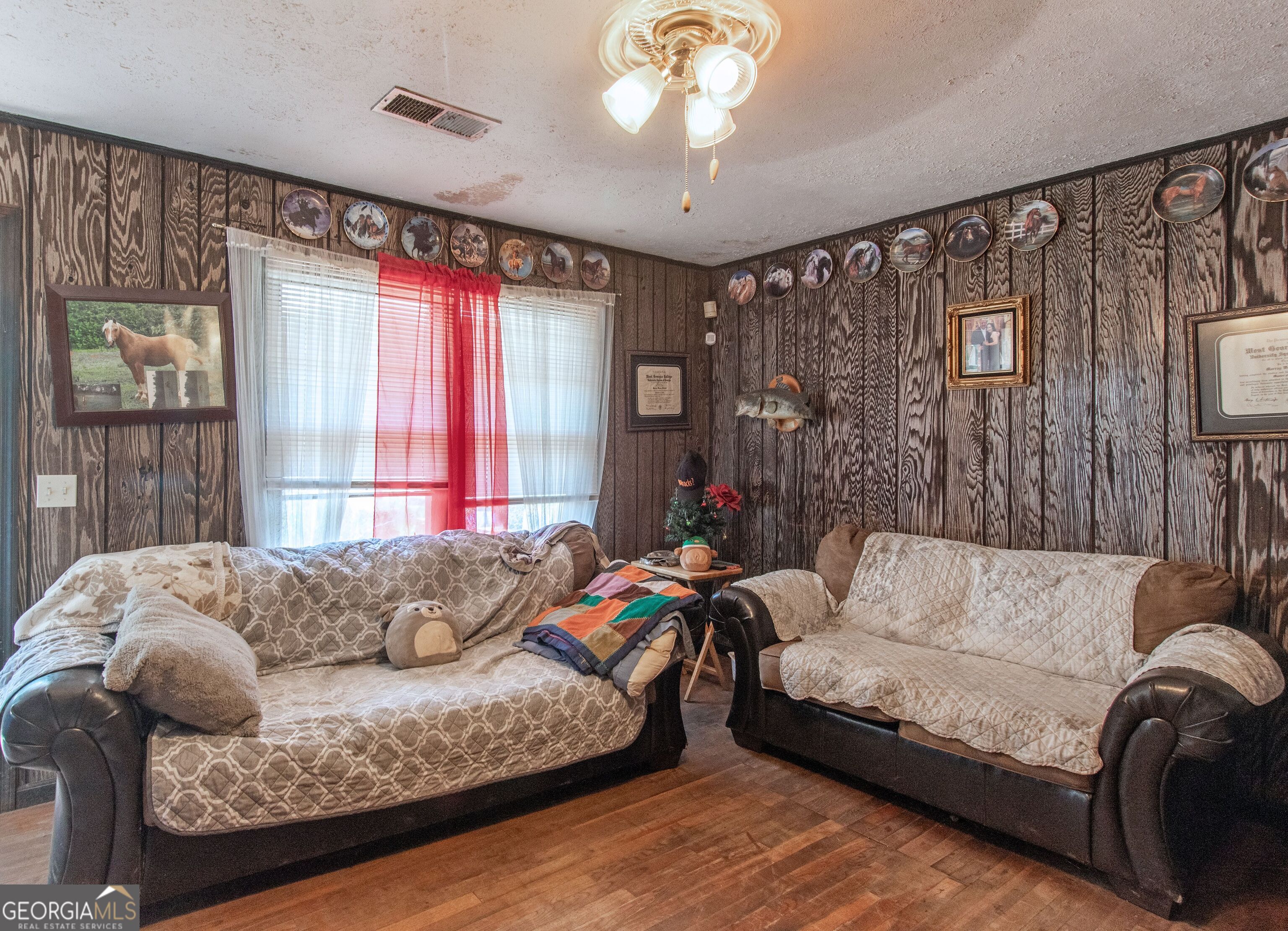 1358 West 5th Highway Roopville, GA 30170 - Photo 14 of 27 a living room with furniture and a large window