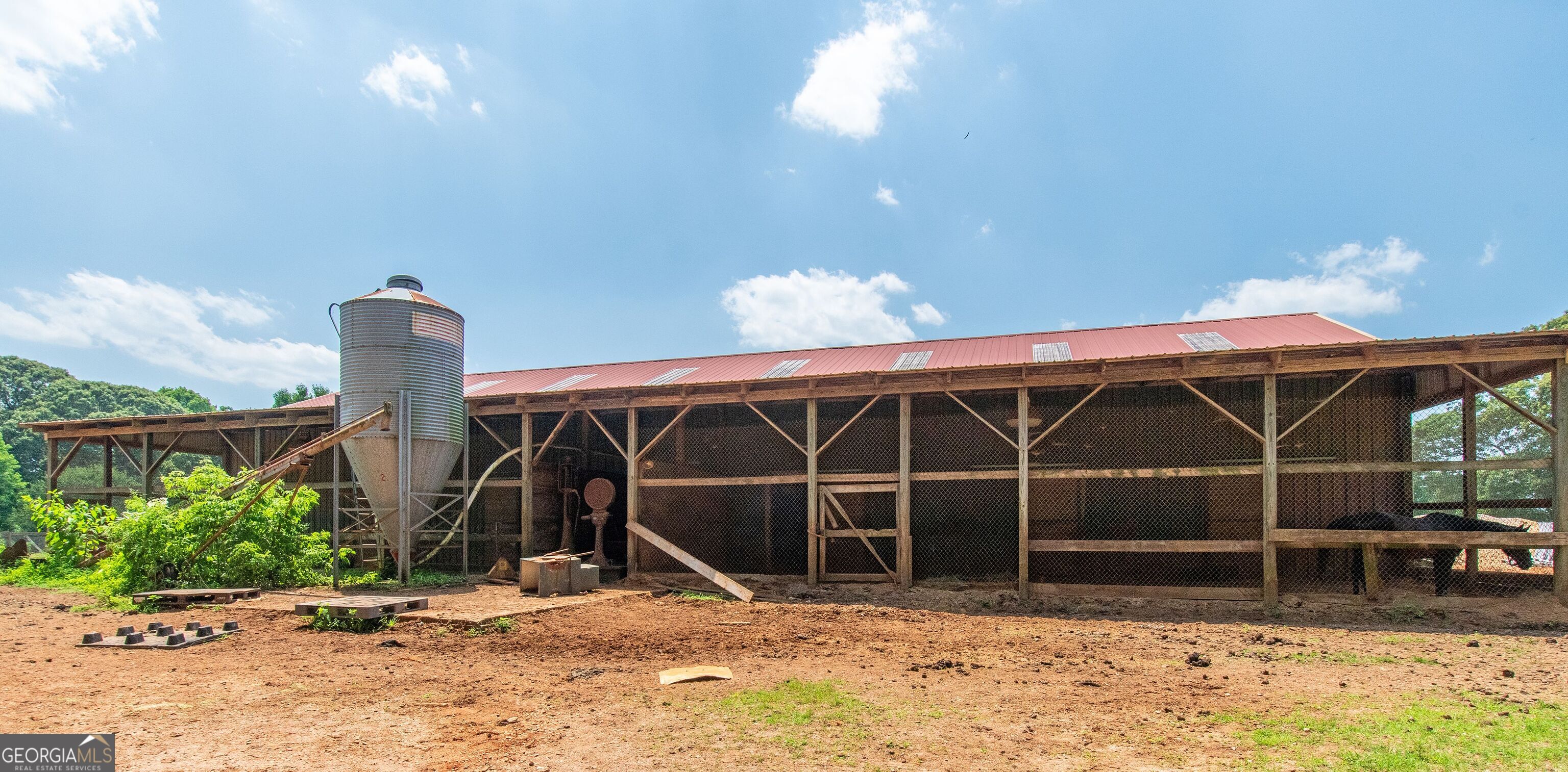 1358 West 5th Highway Roopville, GA 30170 - Photo 6 of 27 a front view of a house with parking space