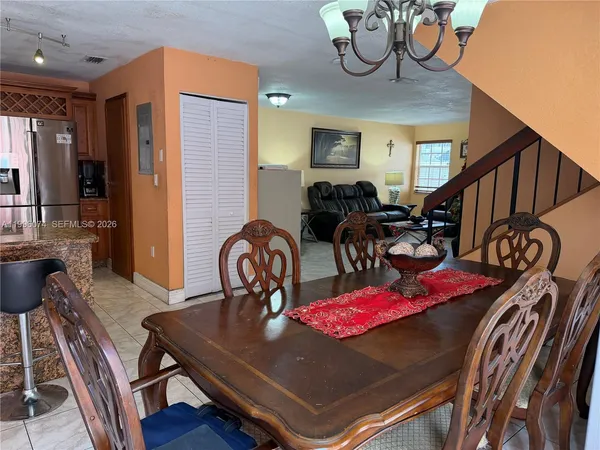 a view of a dining room with furniture