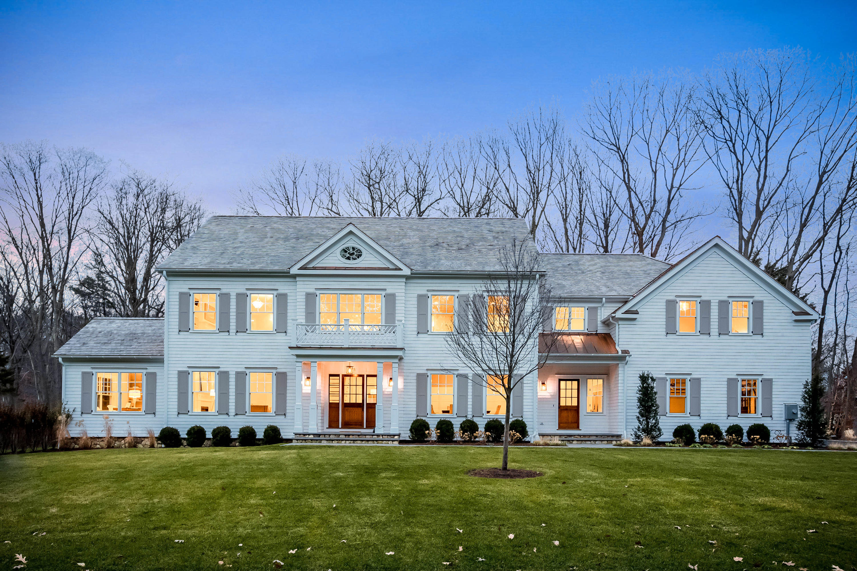 35 Old Parish Road Darien, CT 06820 - Photo 1 of 74 a front view of a house with a garden