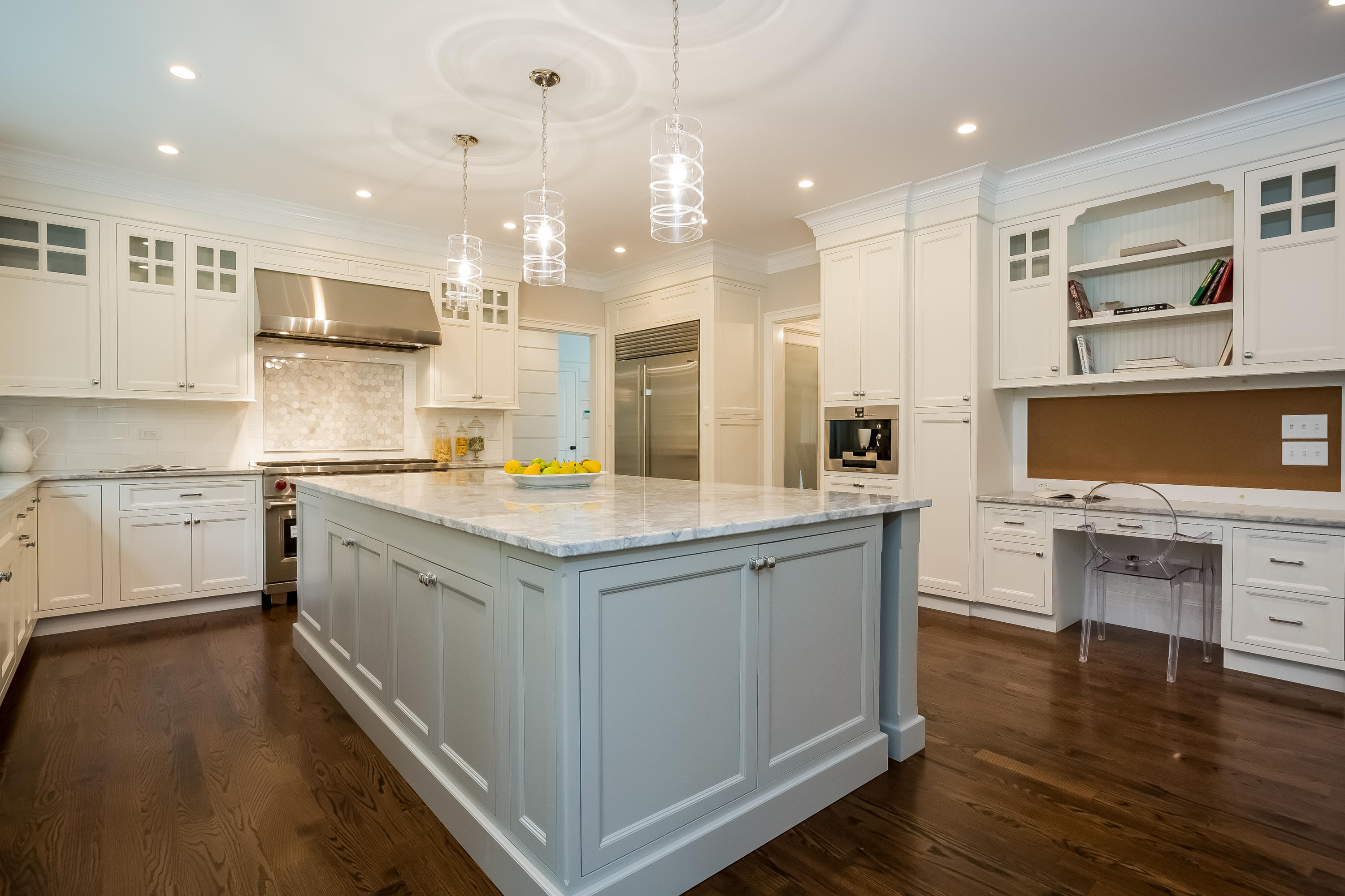 35 Old Parish Road Darien, CT 06820 - Photo 17 of 74 a kitchen with a sink stove and cabinets