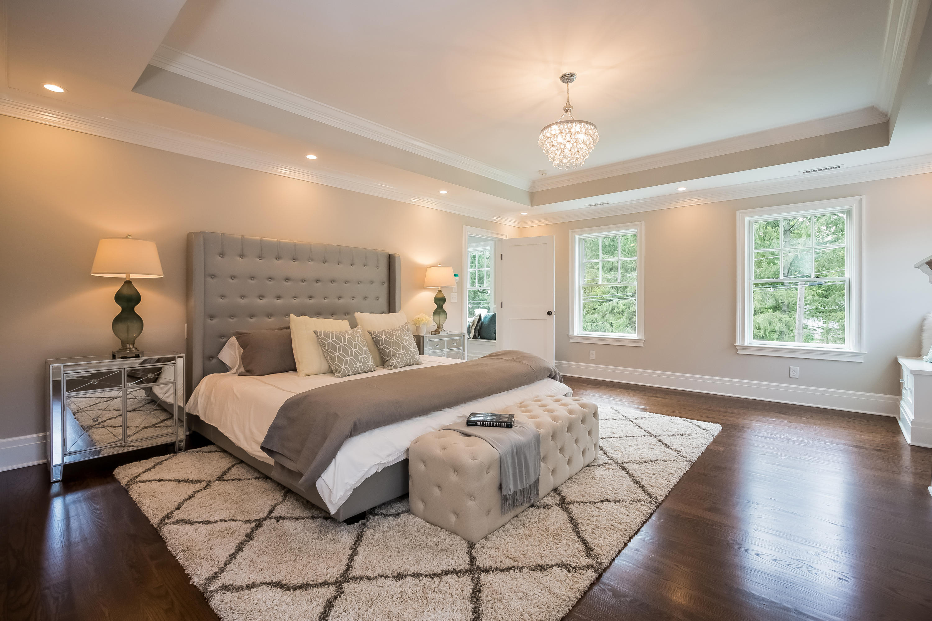 35 Old Parish Road Darien, CT 06820 - Photo 32 of 74 a spacious bedroom with a bed and wooden floor